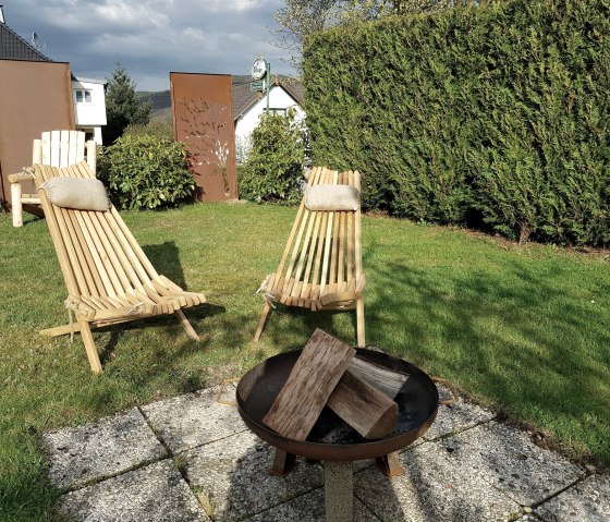 Cozy seating area with barbecue